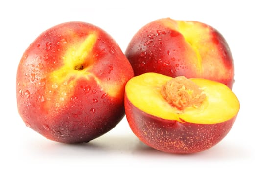 Fresh ripe peaches isolated on white