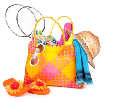 beach bag with towel sunglasses flip-flops and hat.isolated on white