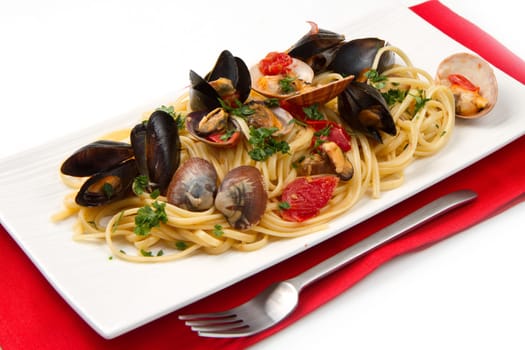 photo of delicious pasta with clams and mussel