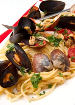 photo of delicious pasta with clams and mussel
