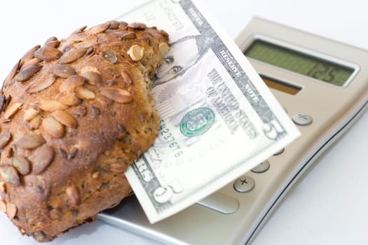 roll with money on pocket calculator