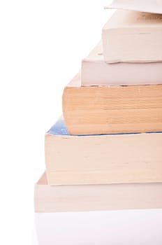 Stack of five, old discoloured books, isolated on white backgroud