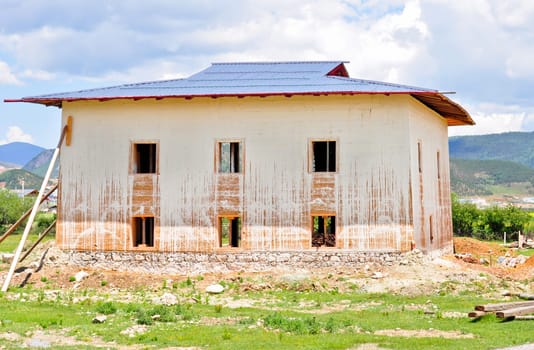 A tibetan style building being constructed in Shangrila, China