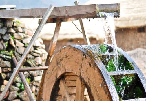 Traditional waterwheel working in a cultural village