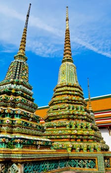 A mosiac colored wat in the center of Bangkok, Thailand on a sunny day