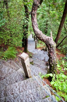 Stone stairs on a steep mountain pathway in a national park in china