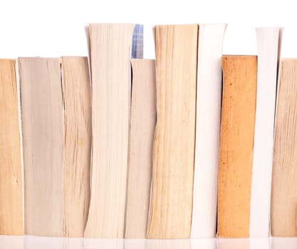 Stack of old books on a white background