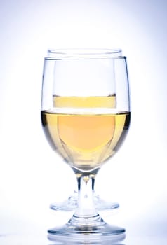 Two Glasses of white wine Isolated on a white background.
