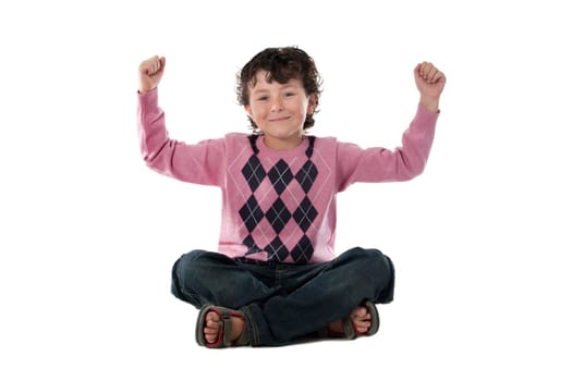 Happy child winner sitting on a over white background