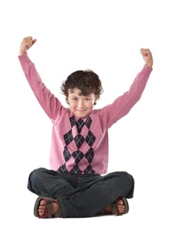 Happy child sitting on a over white background