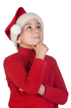 Adorable boy with santa hat isolated thinking on white background