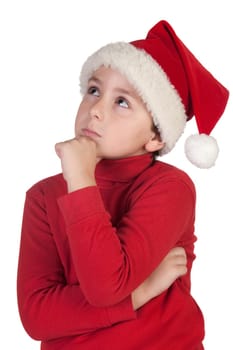 Adorable boy with santa hat isolated thinking on white background