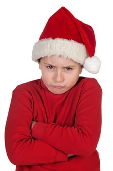 Frowning boy with santa hat isolated on white background