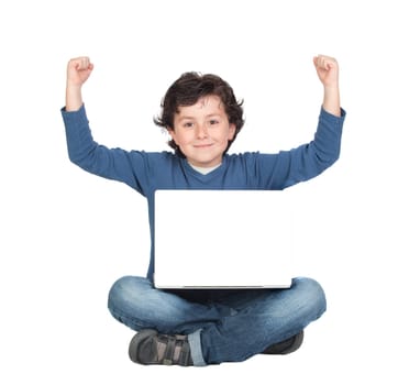 Winner little boy sitting with laptop isolated on white.