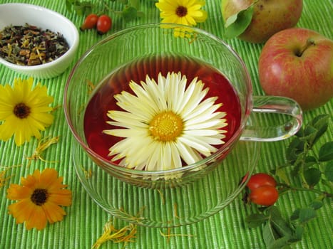 Fruit tea with marigold blossoms,rose hips and apples