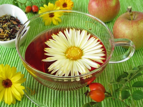 Fruit tea with marigold blossoms,rose hips and apples