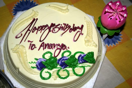 Decorated Birth Day cake and automatic flower candle