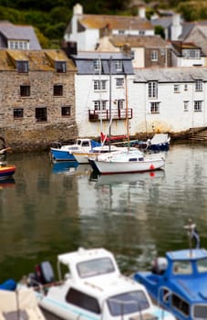 Polperro harbor in Cornwall. Historic cornish fishing village with boats and cottages