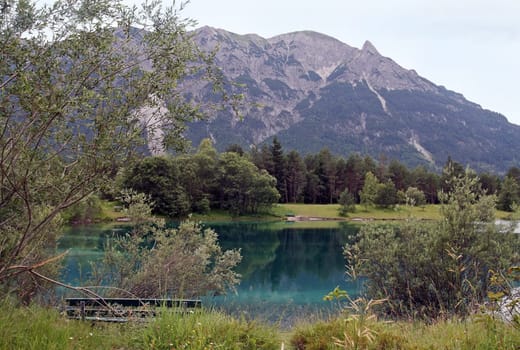 The blue lake in the mountains