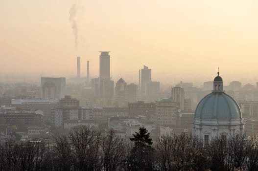 foggy city skyline, brescia