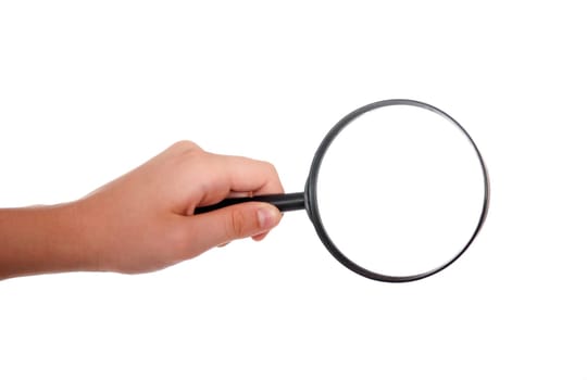 Hand holding a magnifying glass
