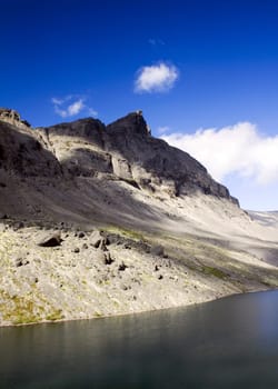 Mountain Lake in Hibinah against the blue sky