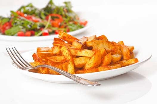 homemade French fries with salad