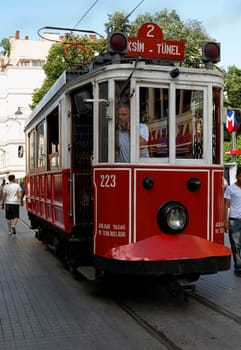 Istanbul, Turkey - June, 2011: street tram at a shopping are Istiklal Caddesi Istanbul, portrait, crop space and copy area