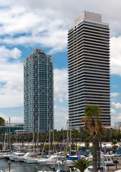 BARCELONA, SPAIN - September 04: Marina BARCELONA, SPAIN - September 4, 2011. A view of the Olympic port of Barcelona city, Including the Mapfre tower, the tower and Hotel Arts Some ships.