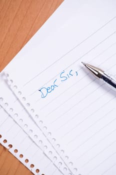 A letter writing to Friend on white lined paper