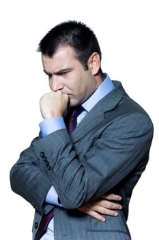 Portrait of a pensive worried businessman in studio on isolated white background