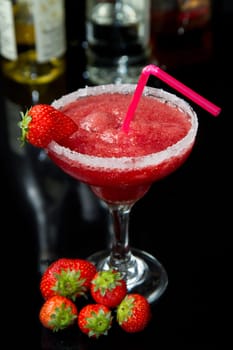 strawberry cocktail on black background
