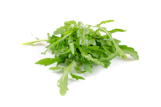 Ruccola salad fresh heap leaf isolated on a white