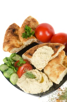 Bread with pate and fresh vegetables of tomatoes and cucumbers