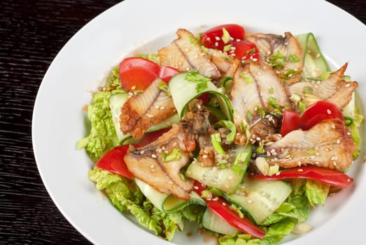 Salad of smoked eel, lettuce,Chinese cabbage and vegetables