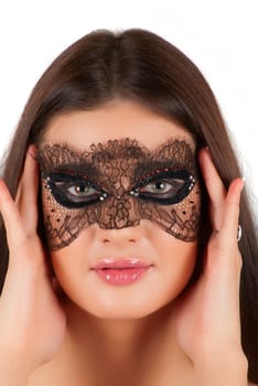 girl at mask closeup on a white background