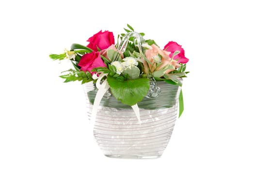 Bunch of roses in a vase isolated on white background