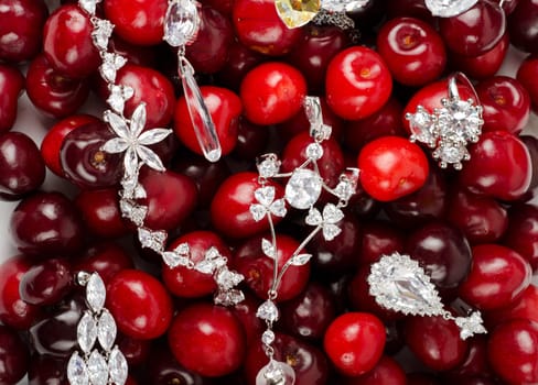 Jewels at fruit red ripe cherries berry background