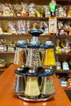Different spices on the counter of market