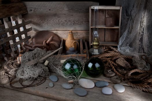 Old fishing net and rope with wooden background