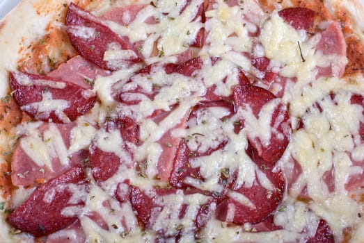 Salami pizza isolated on a white background