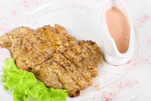 fried chicken steak with greens and lettuce