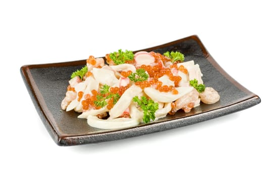 Seafood salad ar plated isolated on a white background