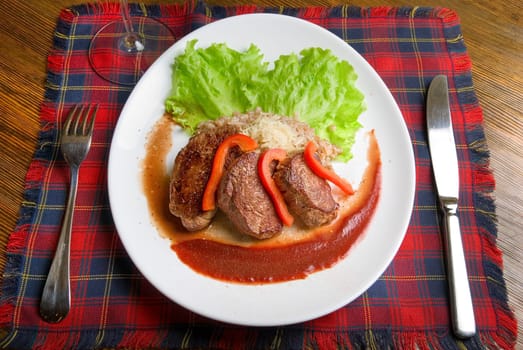 Roast maral meat with blood and garnish pearl barley - very tasty dish