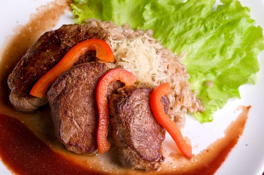 Roast maral meat with blood and garnish pearl barley - very tasty dish