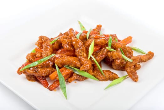 Roasted Beef at sour-sweet sauce on a white background