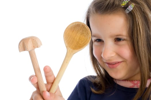 six-year-old girl with wooden spoons (mr)