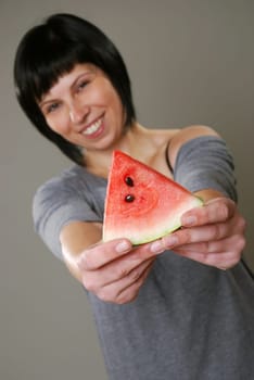 Young woman with melon