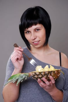 Eating pineapple