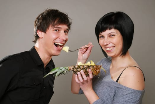 Eating pineapple